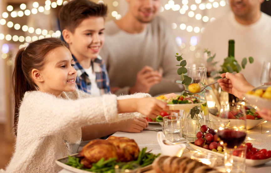 He is to having dinner. Have a Family dinner. Family which Uzbek people are having the dinner.